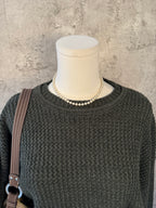 Dark green sweater