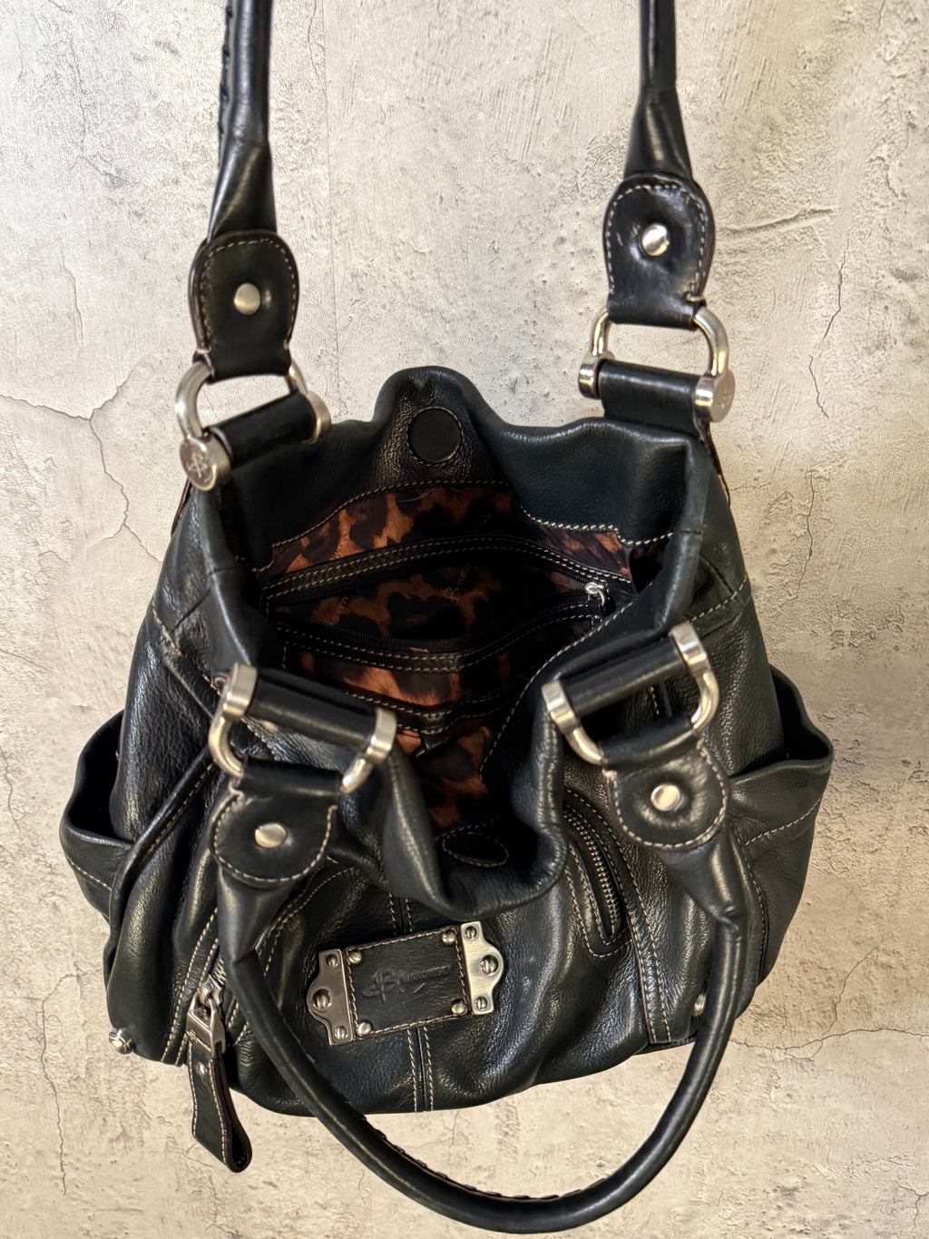 B. Makowsky Black purse W/ animal print interior