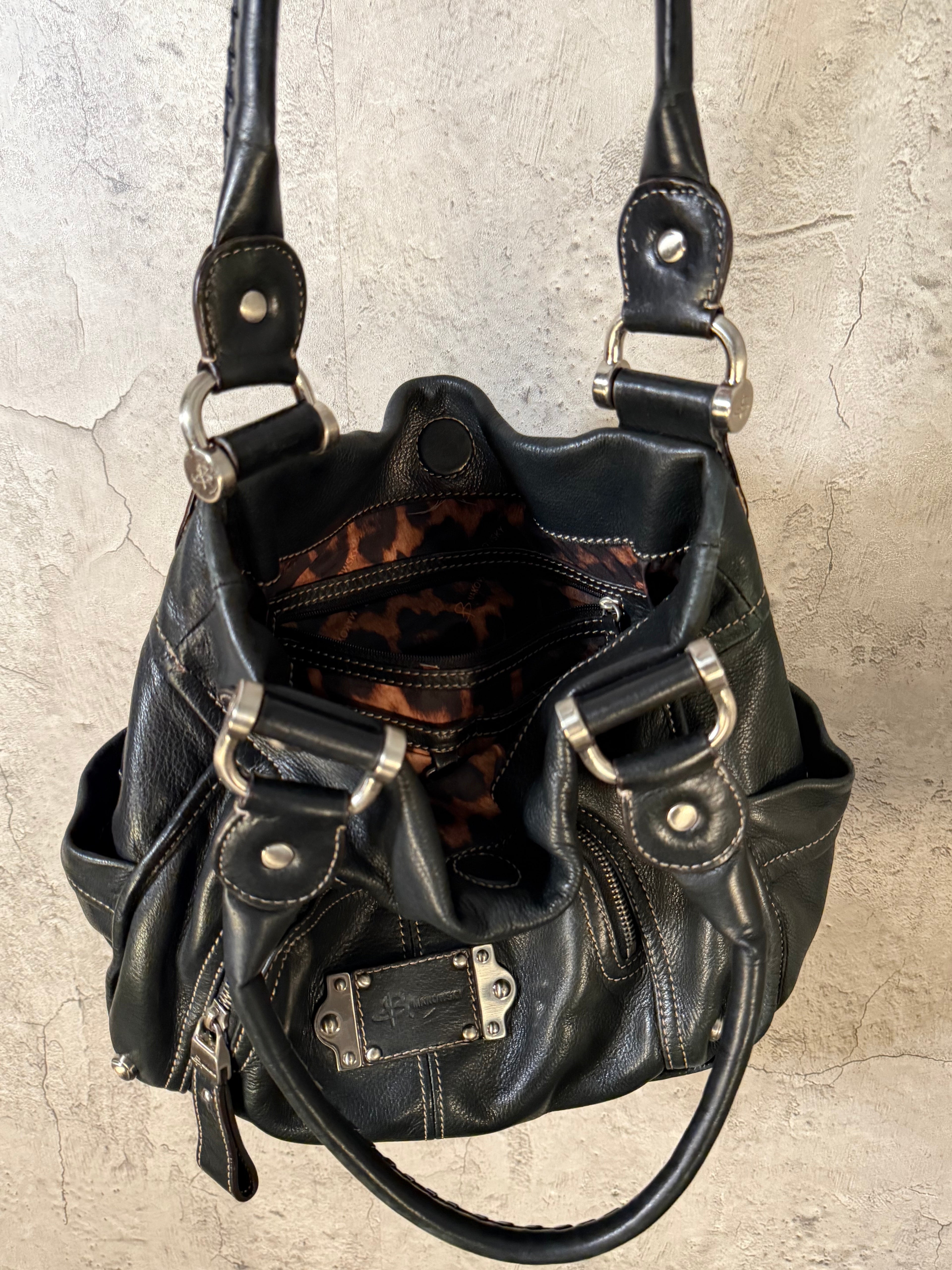 B. Makowsky Black purse W/ animal print interior