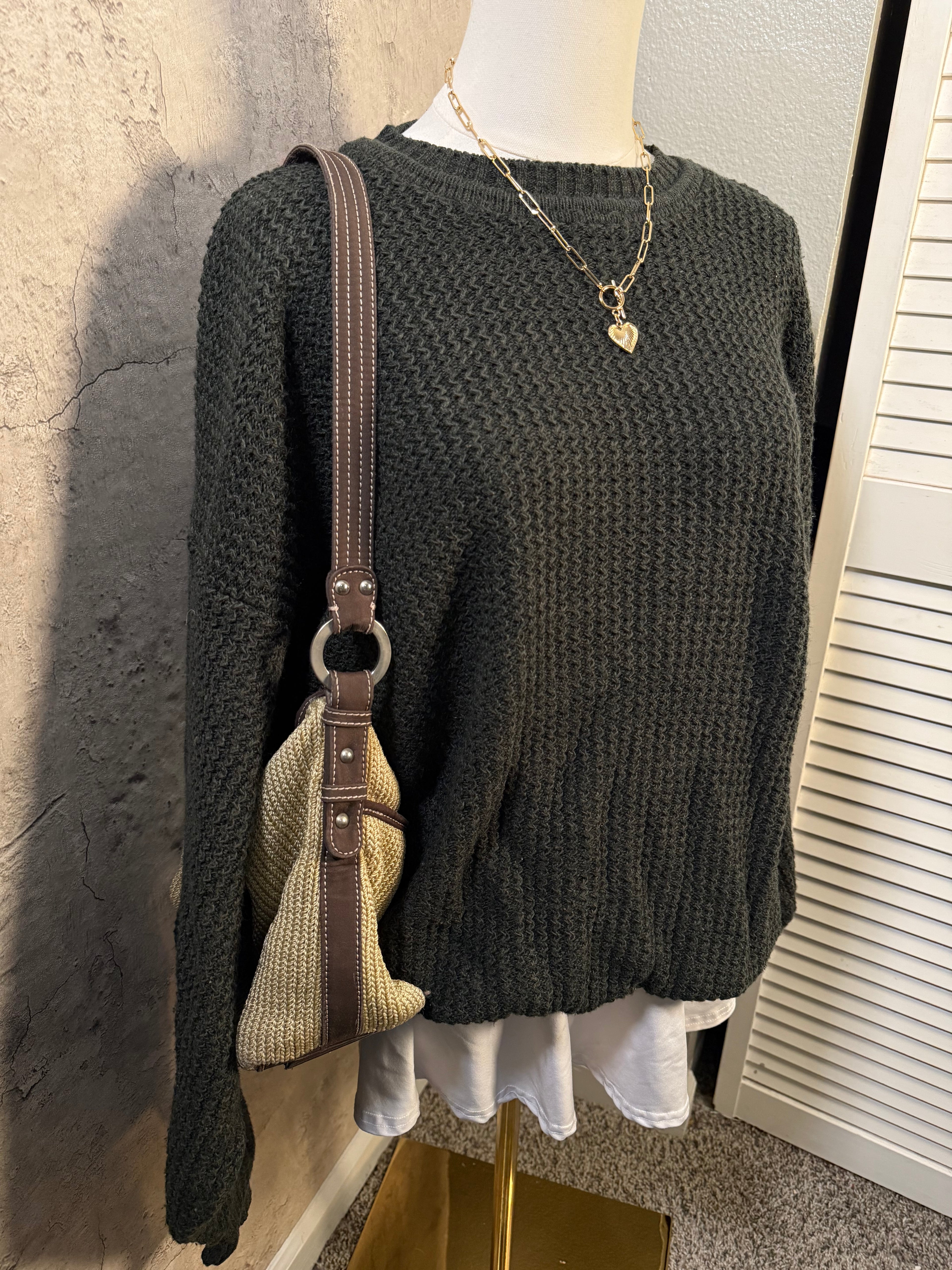 Dark green sweater