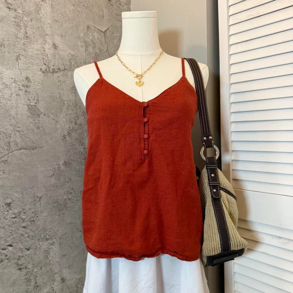 Dark orange top