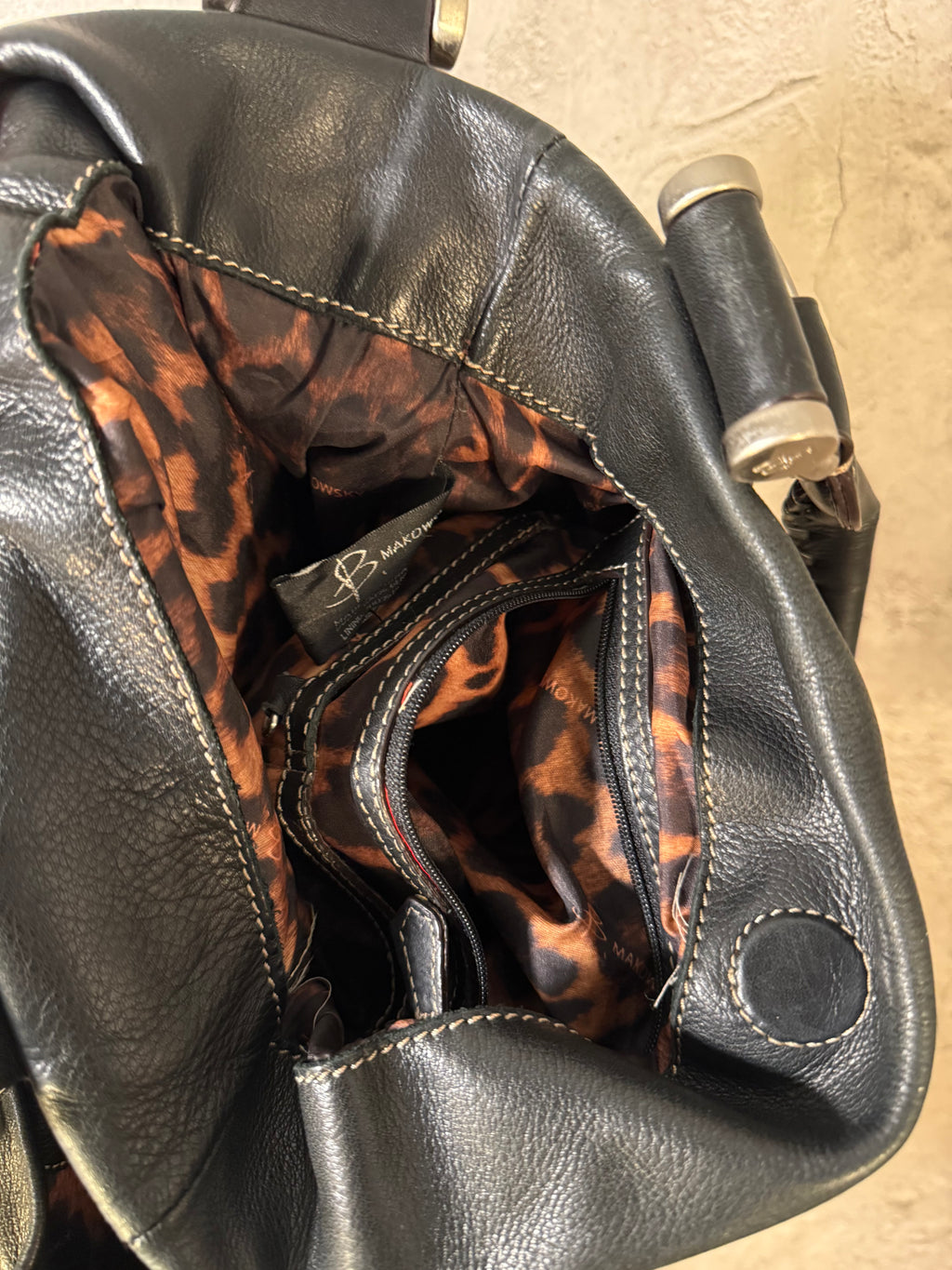 B. Makowsky Black purse W/ animal print interior